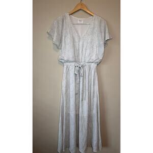 Sienna Sky Polka Dot white and black dress with waist tie